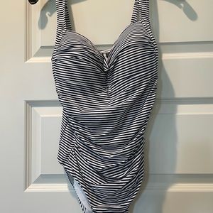 Very flattering navy stripe NipTuck swimsuit in excellent condition, size 10.
